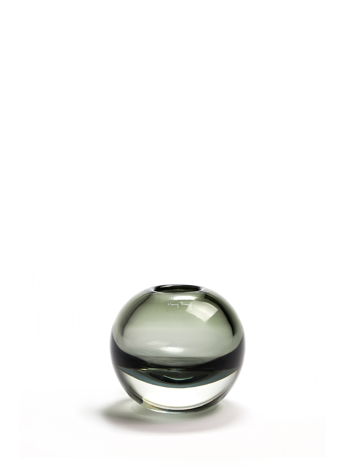 Small round handmade glass vase in a smoke grey color