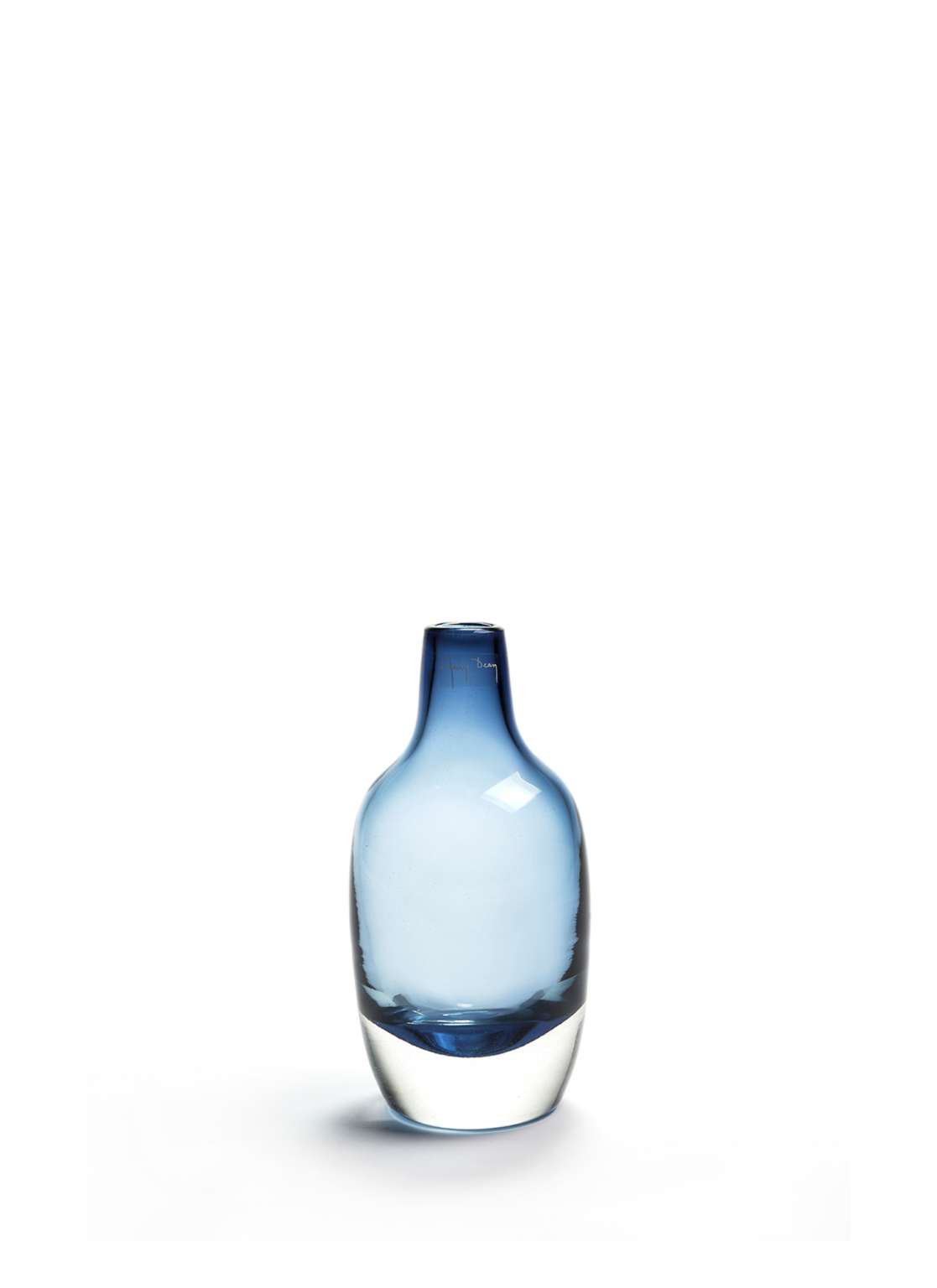 Handmade glass vase in the shape of a bottle, in light blue